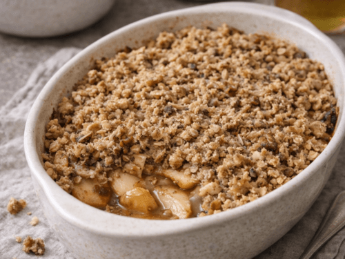 baking dish with golden walnut apple crumble