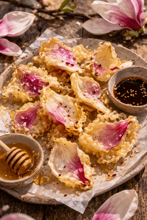 crispy magnolia tempura flowers on plate golden light batter aesthetic